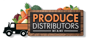 A graphic design for "Produce Distributors Miami" featuring a black delivery truck carrying colorful produce such as carrots, broccoli, tomatoes, and apples, next to a wooden sign with the text "Produce Distributors Miami" in bold orange and white letters.